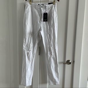 White distressed skinny jeans